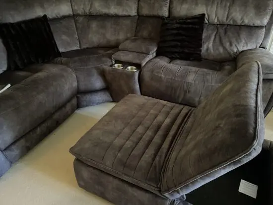 This is a fabric Sofology Radleigh Manual Recliner with Dual Footstool with Storage