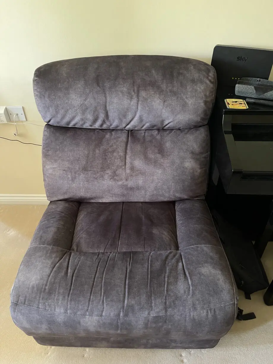 This is a fabric Sofology Radleigh Manual Recliner with Dual Footstool with Storage
