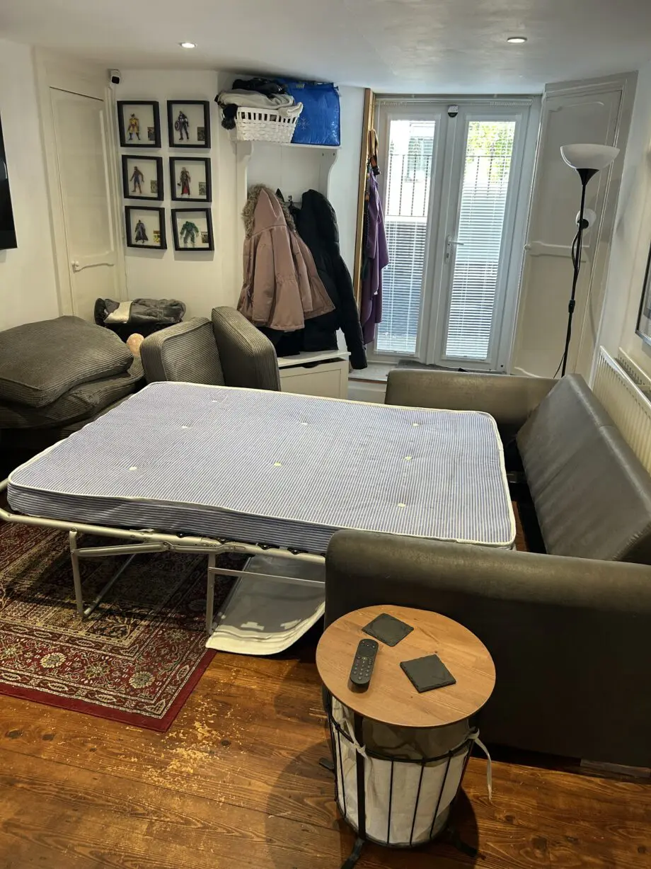 DFS grey sofa bed, footstool and cuddler chair set