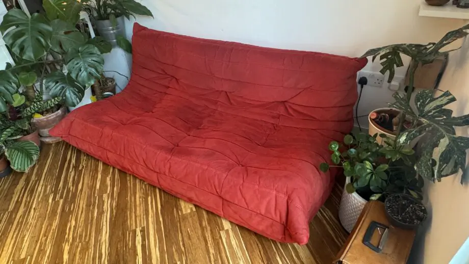 Line Roset Togo in Goya Red alcantara by Michel Ducaroy