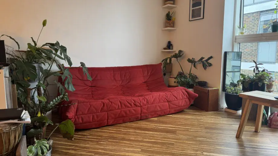 Line Roset Togo in Goya Red alcantara by Michel Ducaroy