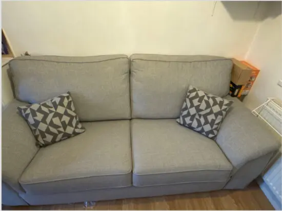 Light grey double seater sofa