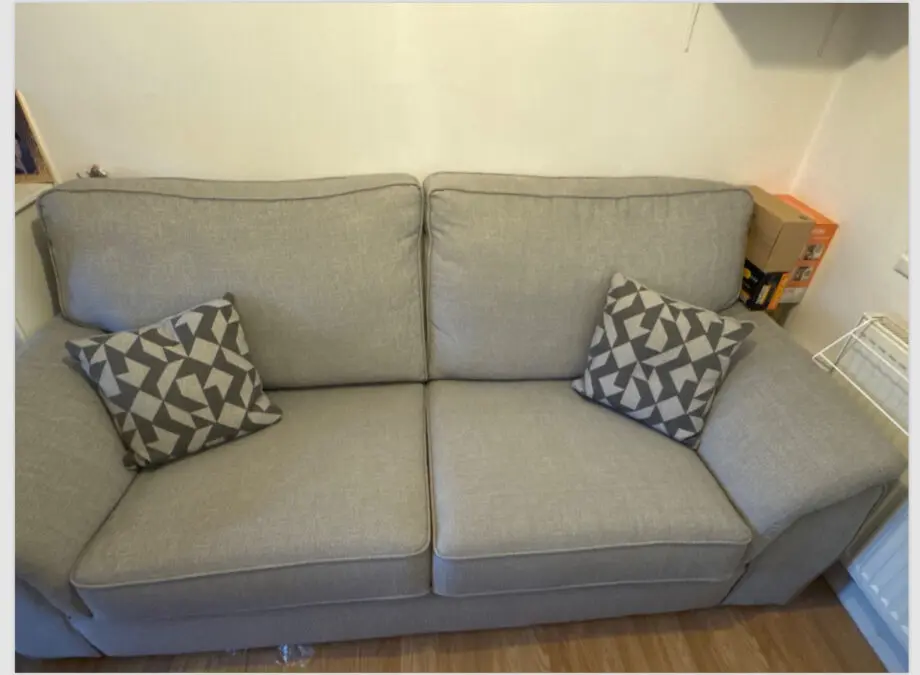 Light grey double seater sofa