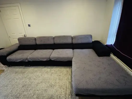 Sofa Bargain-Black corner sofa extendable made in Poland.