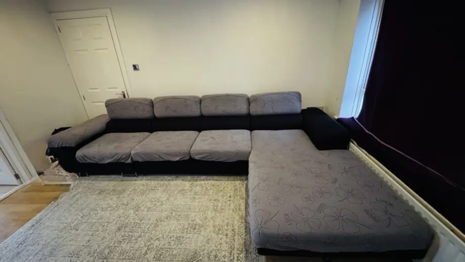 Sofa Bargain-Black corner sofa extendable made in Poland.