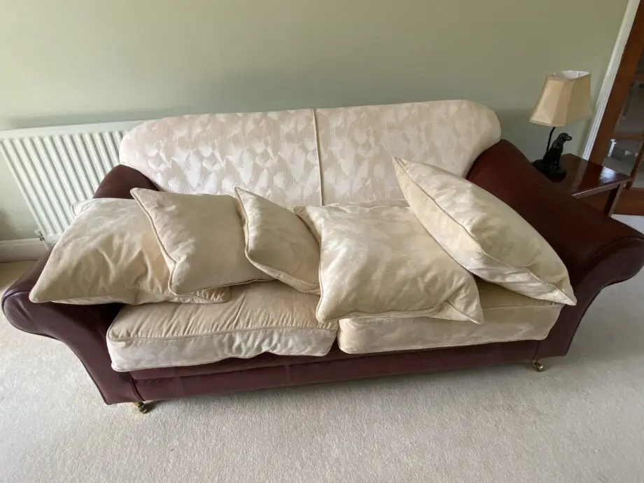 Tetrad style red/brown leather and cream upholstered back and cushions