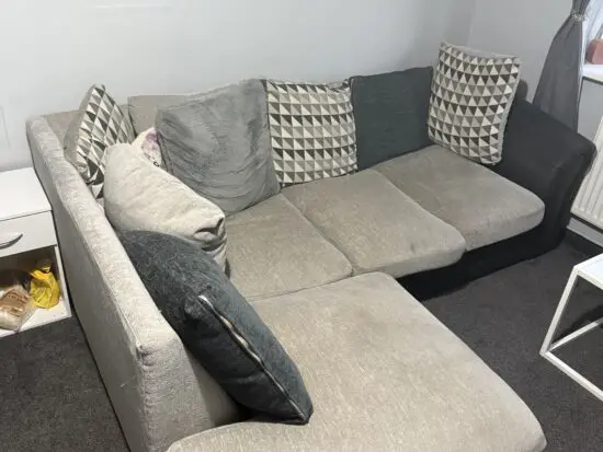 Corner sofa , grey and black