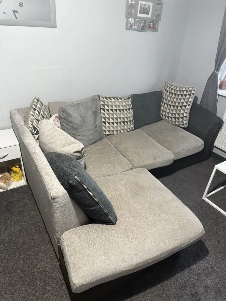 Corner sofa , grey and black