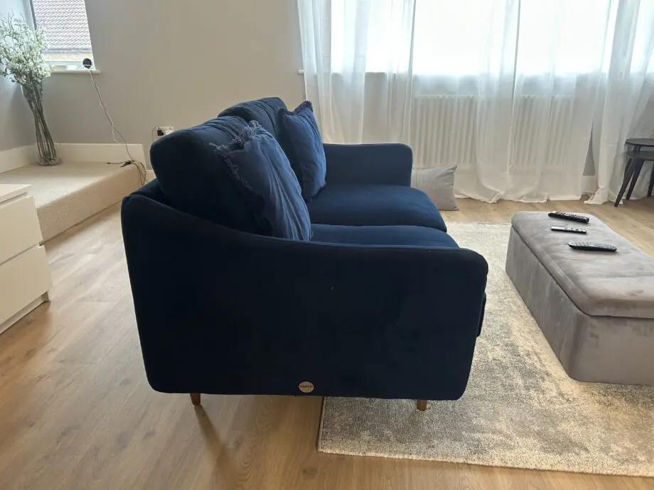 Snug velvet blue sofa