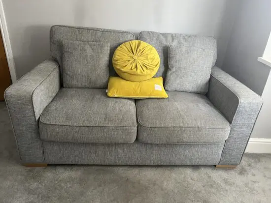 2 grey two seater sofas