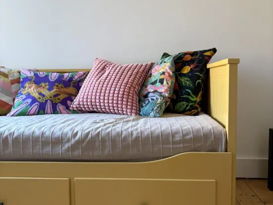IKEA mustard sofa bed with mattress