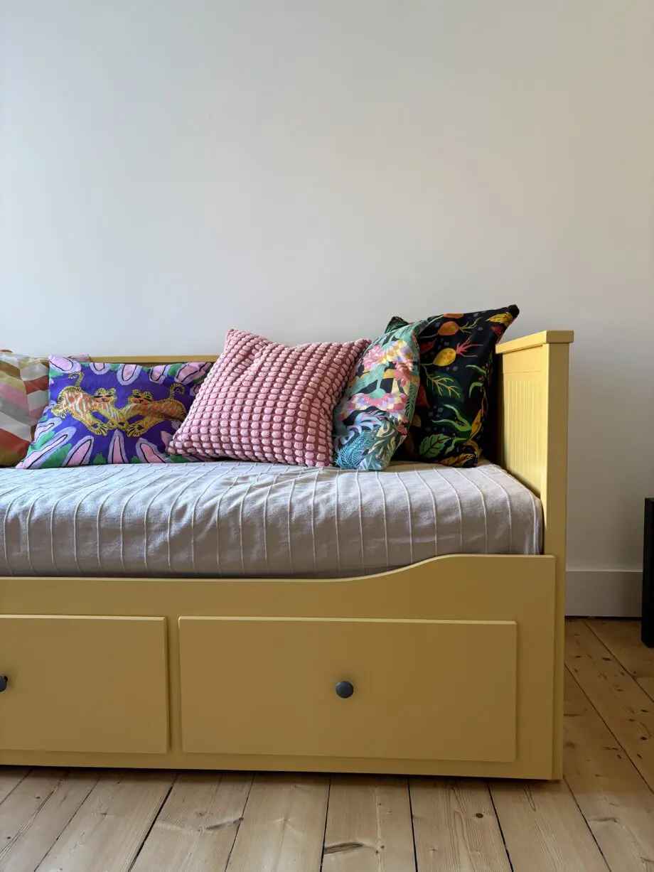 IKEA mustard sofa bed with mattress