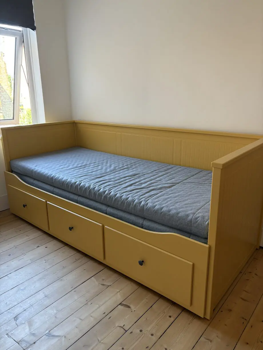 IKEA mustard sofa bed with mattress