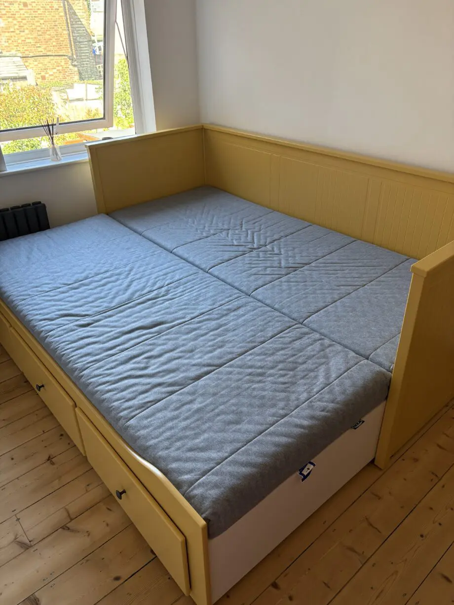IKEA mustard sofa bed with mattress