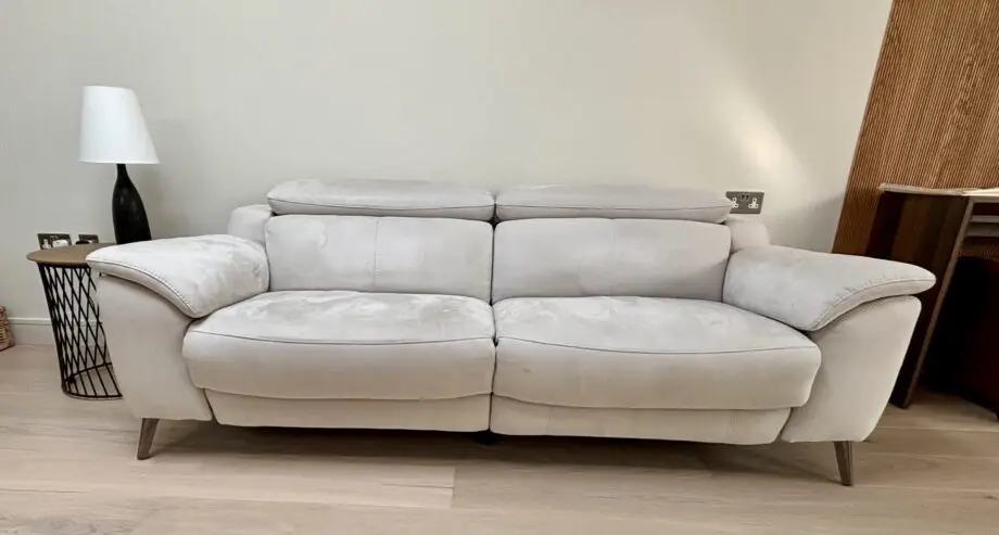 Beautiful white, auto reclining Sofology couch