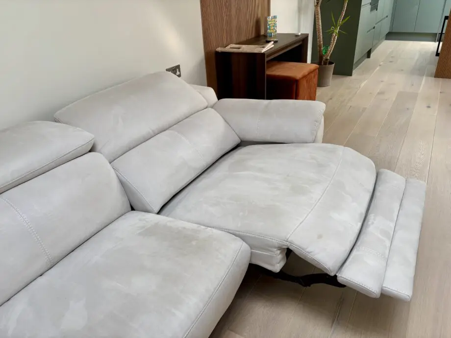 Beautiful white, auto reclining Sofology couch