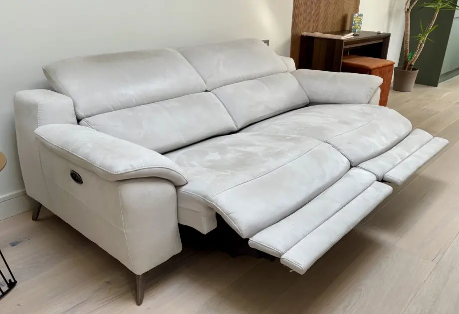 Beautiful white, auto reclining Sofology couch