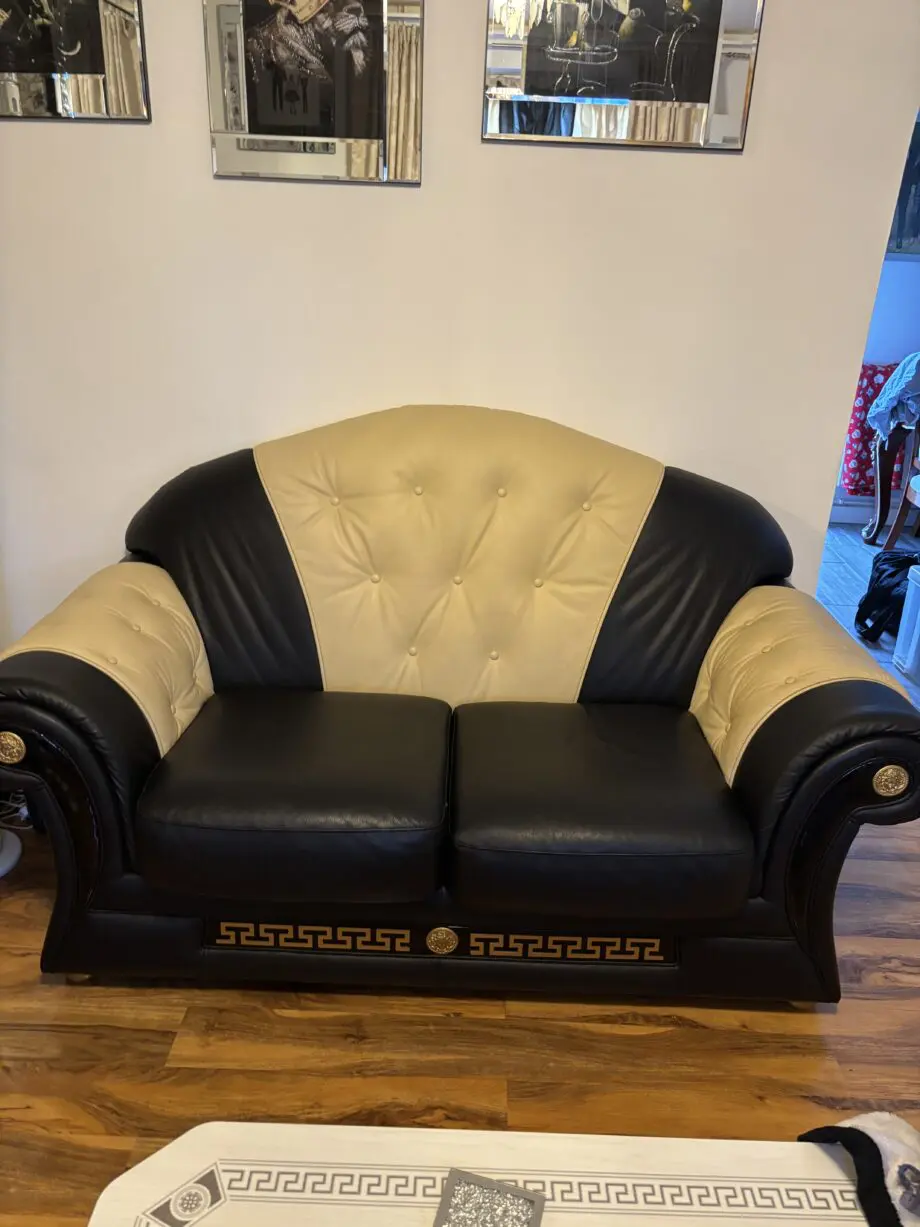 Black and beige Italian sofa set with Versace pattern and emblems