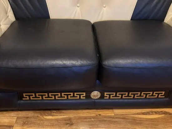 Black and beige Italian sofa set with Versace pattern and emblems
