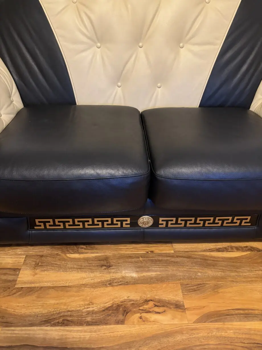 Black and beige Italian sofa set with Versace pattern and emblems