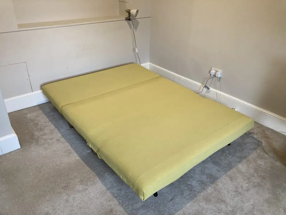 M&S dark yellow sofa bed