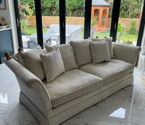 Two Laura Ashley cream sofas