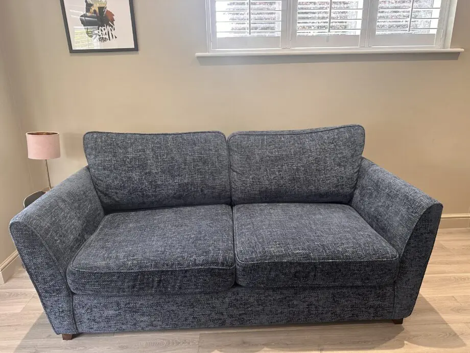 Blue 3 seater sofa bed and matching love seat