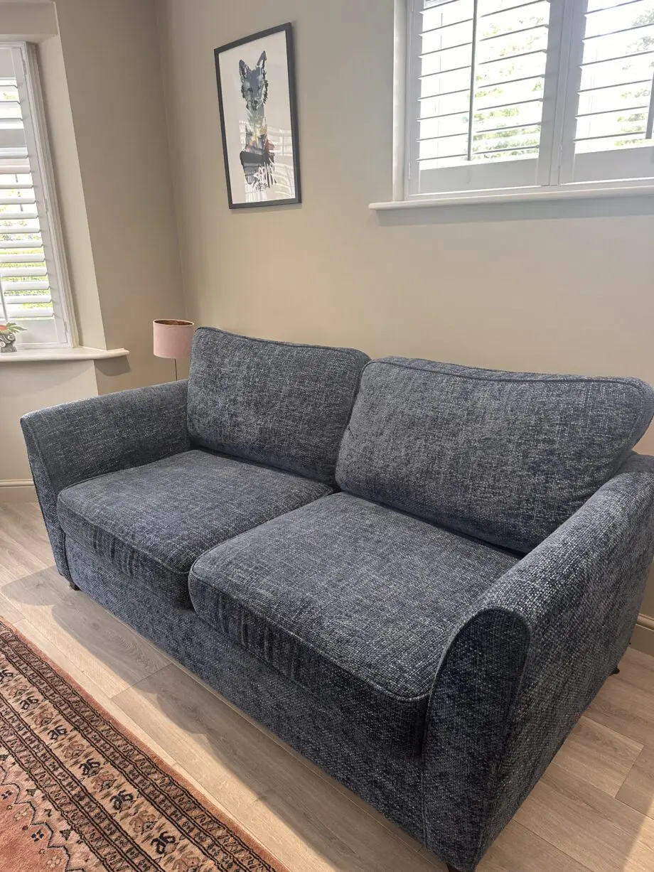Blue 3 seater sofa bed and matching love seat