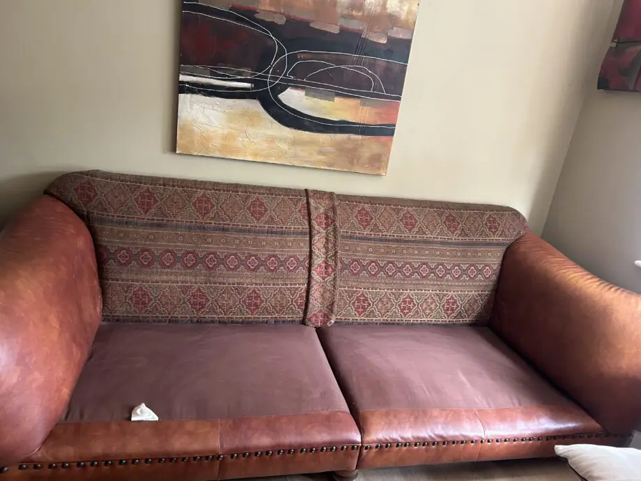 Furniture village tan leather arms and fabric seating 3 and 4 seater sofas