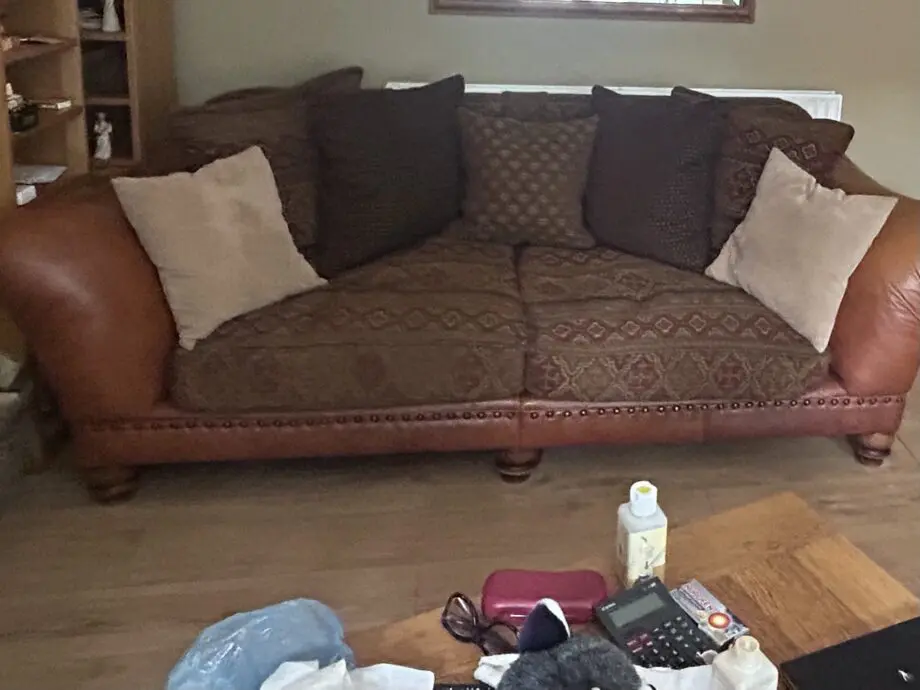 Furniture village tan leather arms and fabric seating 3 and 4 seater sofas