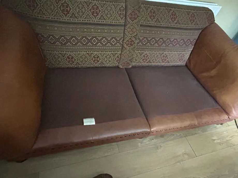 Furniture village tan leather arms and fabric seating 3 and 4 seater sofas