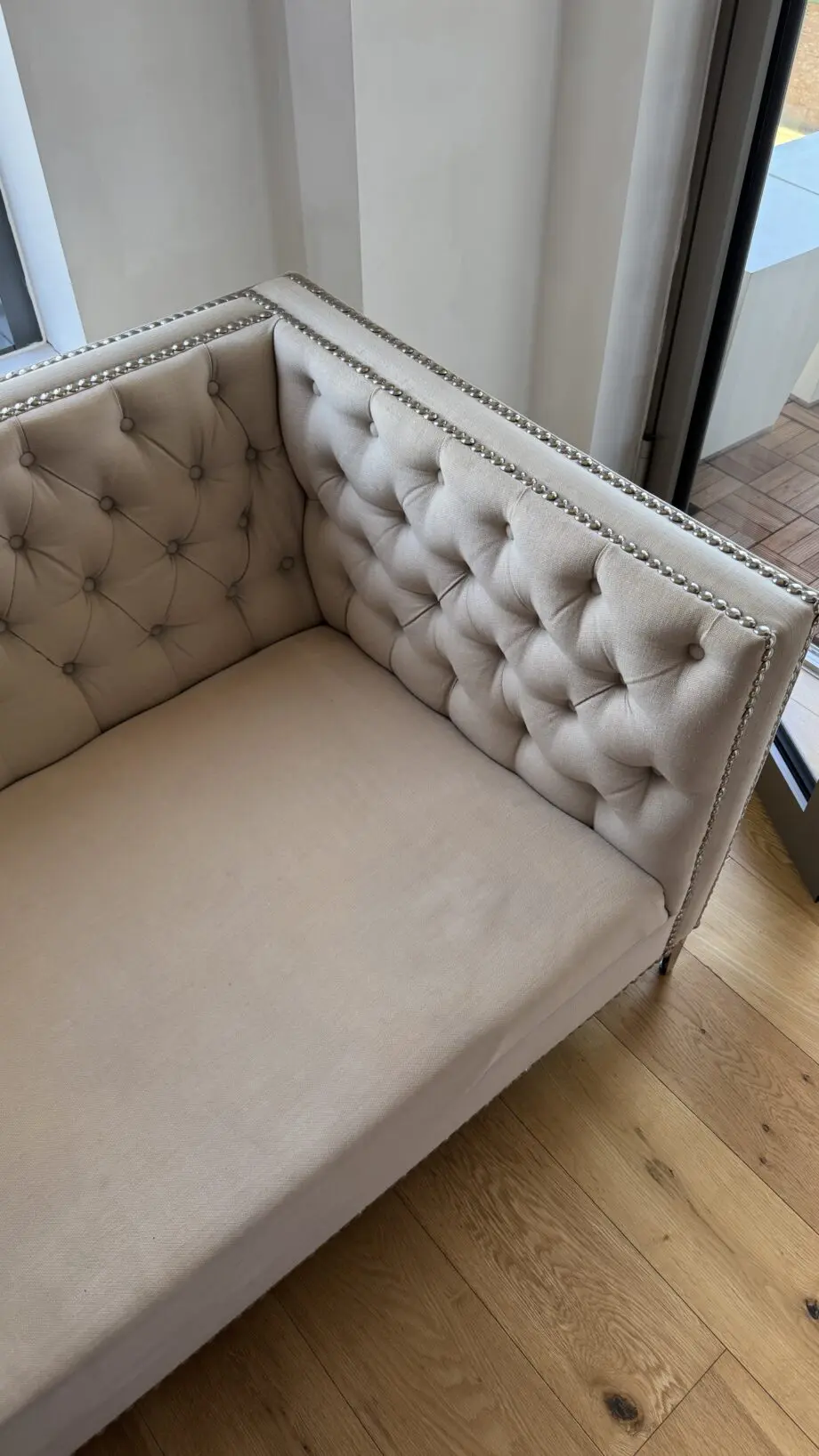 3 seated sofa in beige colour