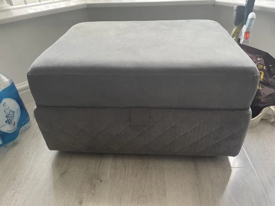 DFS grey ORKA corner sofa with matching foot stool