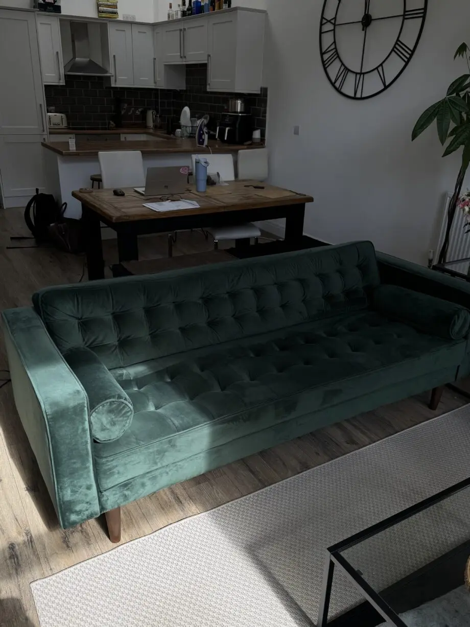 Green velvet sofa