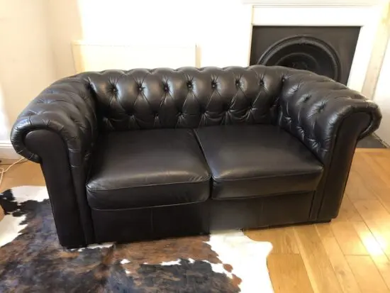 Dark brown leather Chesterfield