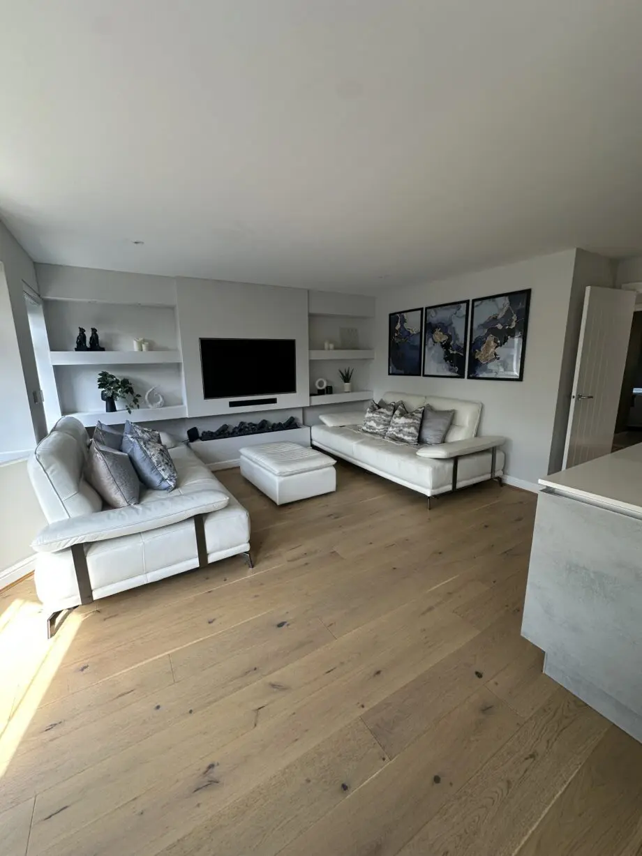 Artemis white leather sofa and footstool