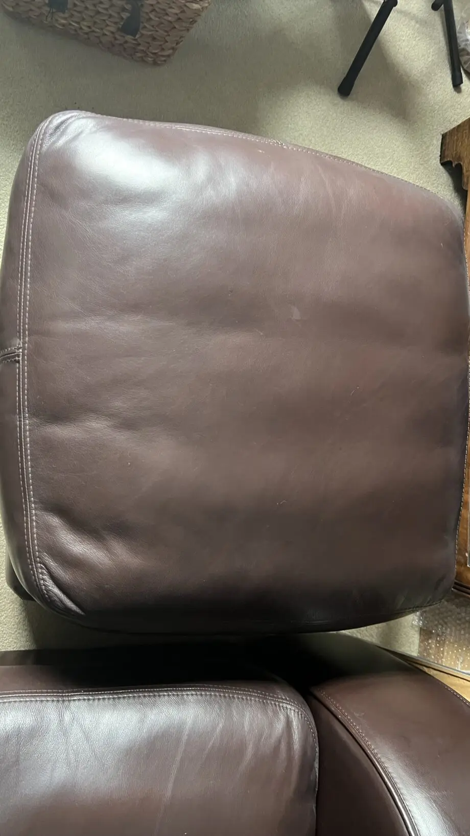 Brown leather 2 seater and matching footstool