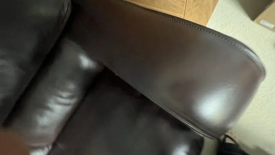 Brown leather 2 seater and matching footstool