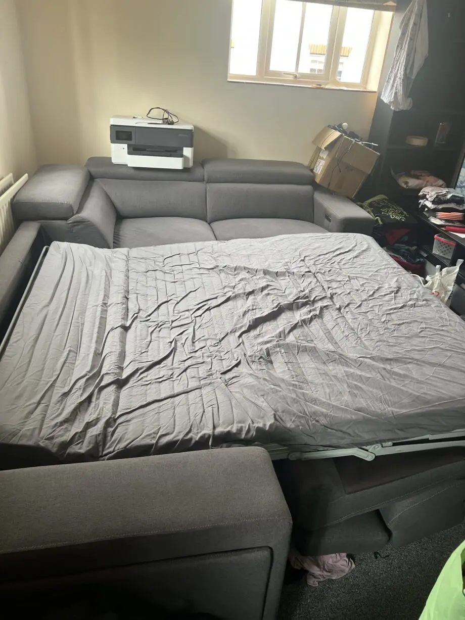 Dfs Grey sofa with built in double bed, recliner chair and charging ports