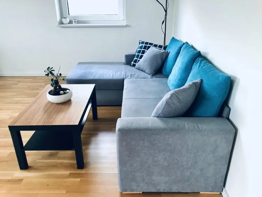 Grey/turquoise Corner Sofa/Bed with storage