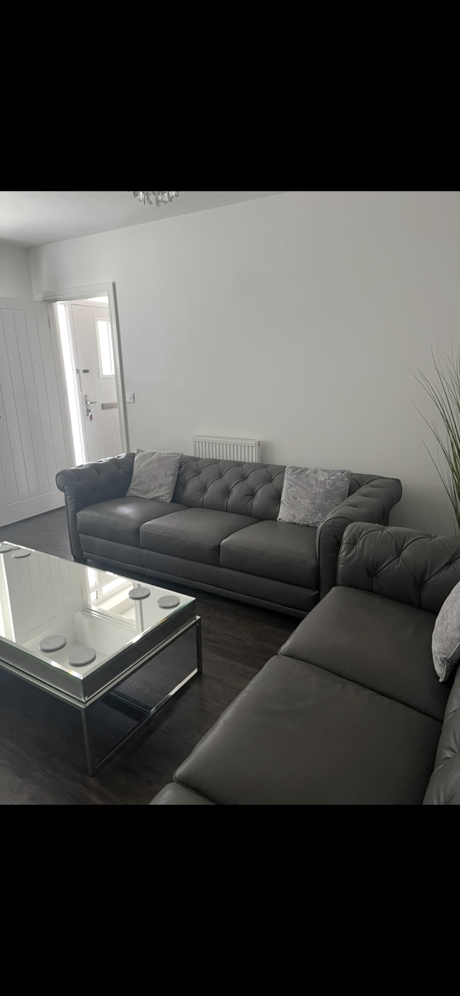 Dark grey 3 seater Natuzzi sofa
