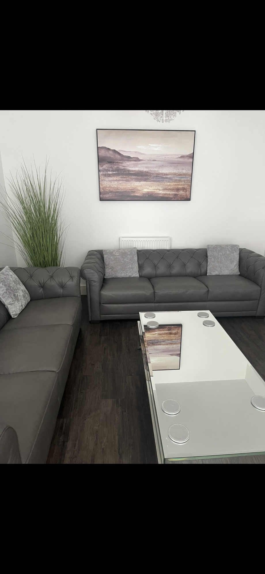 Dark grey 3 seater Natuzzi sofa