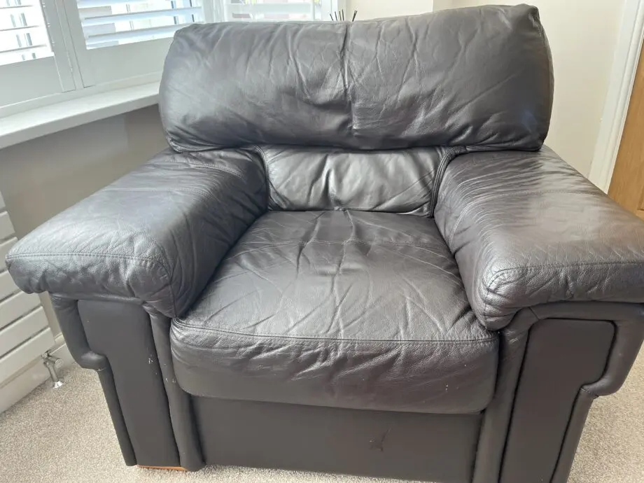 Dark brown leather 3 seater sofa, armchair & footstool
