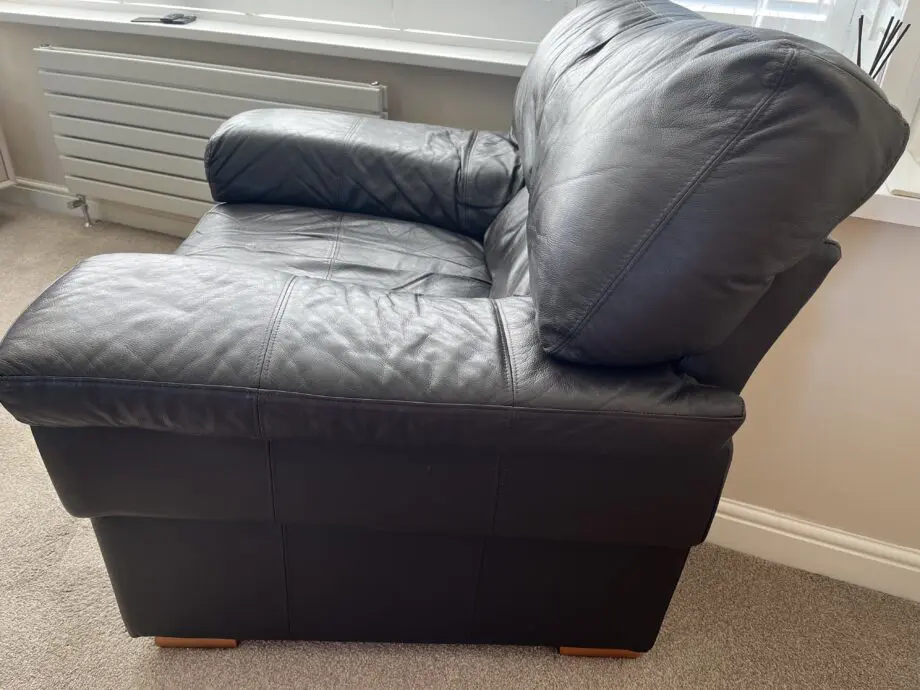 Dark brown leather 3 seater sofa, armchair & footstool