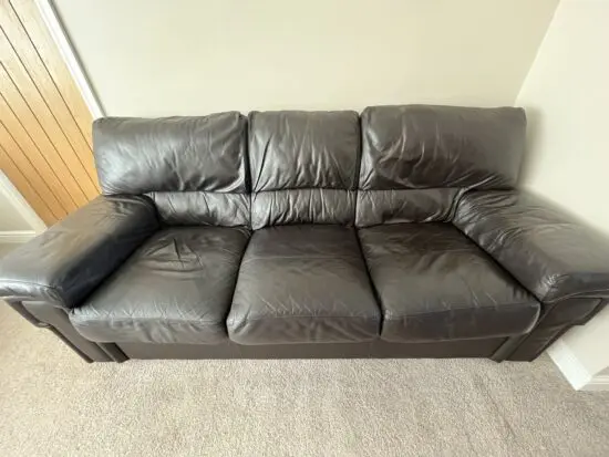 Dark brown leather 3 seater sofa, armchair & footstool