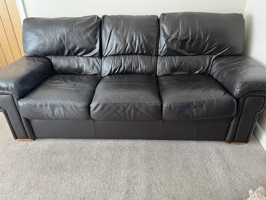 Dark brown leather 3 seater sofa, armchair & footstool
