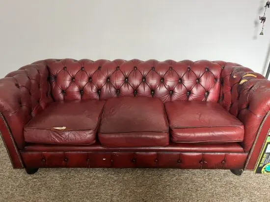 Dark red chesterfield sofa