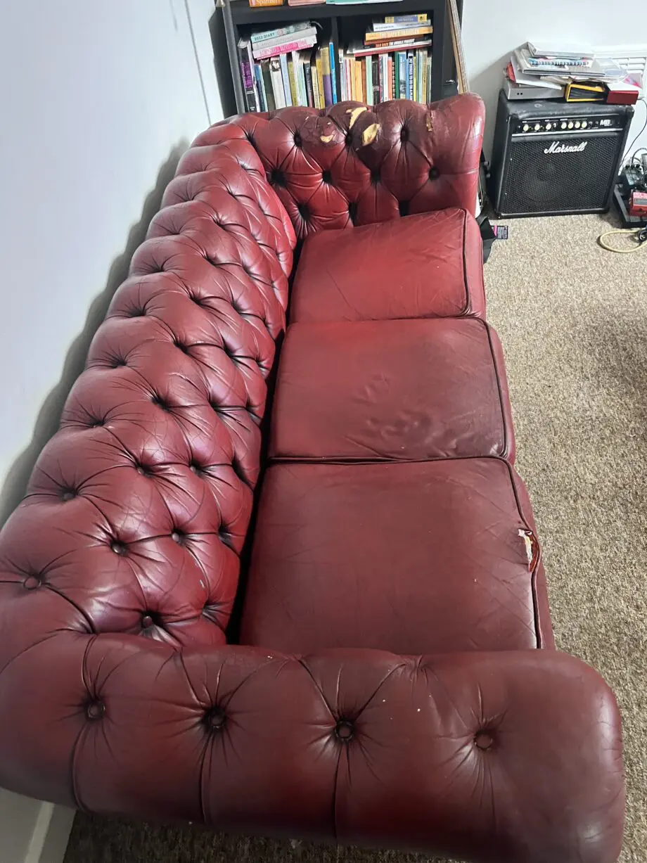 Dark red chesterfield sofa