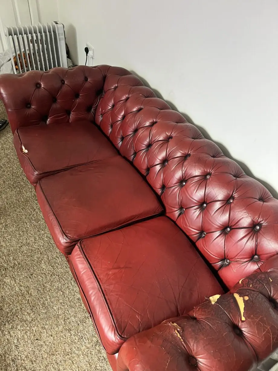 Dark red chesterfield sofa