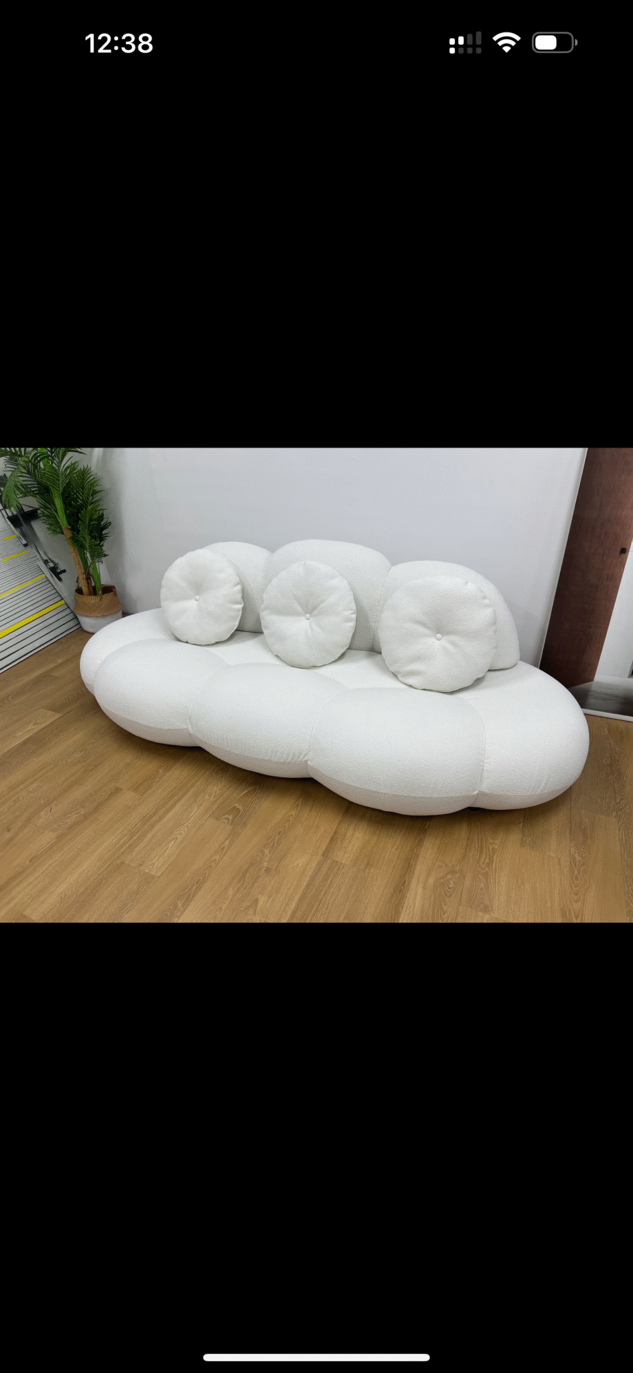 Musa Pillow Sofa Introducing the Musa Pillow Sofa, a contemporary piece that combines elegance and comfort in one. This armless sofa is designed with luxurious wool-feel polyester fiber upholstery and comes with pillows to enhance your relaxation experience. It's the perfect addition to your living room for both style and coziness.